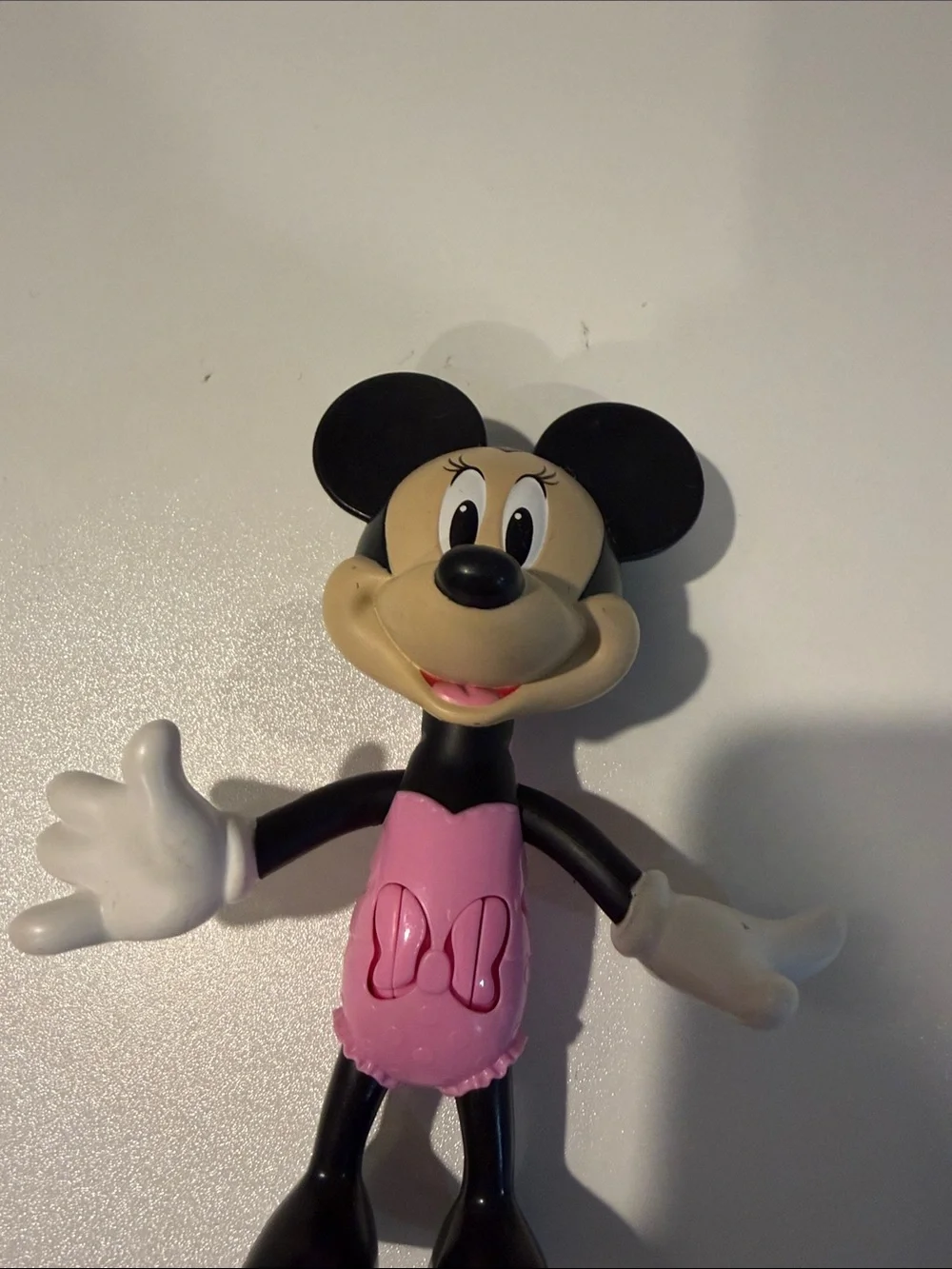 Minnie Mouse with push button arms and head figurine